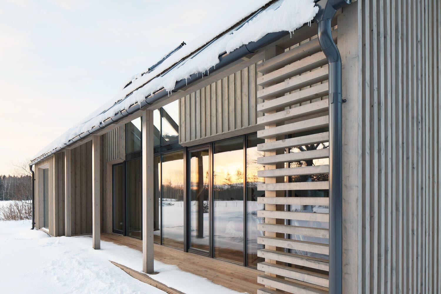 Smartwin passive house certified timber-aluminium windows on a Nordic home in winter